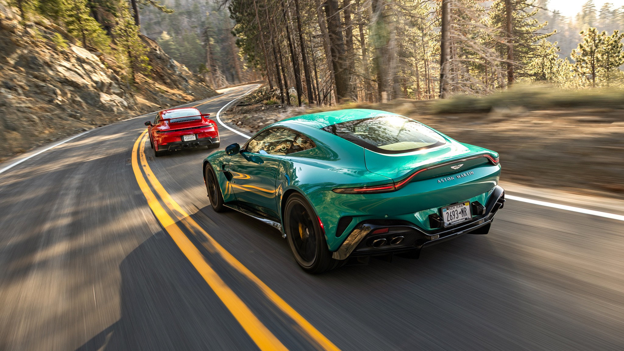 004 2025 Aston Martin Vantage Porsche 911 Rear three quarter action