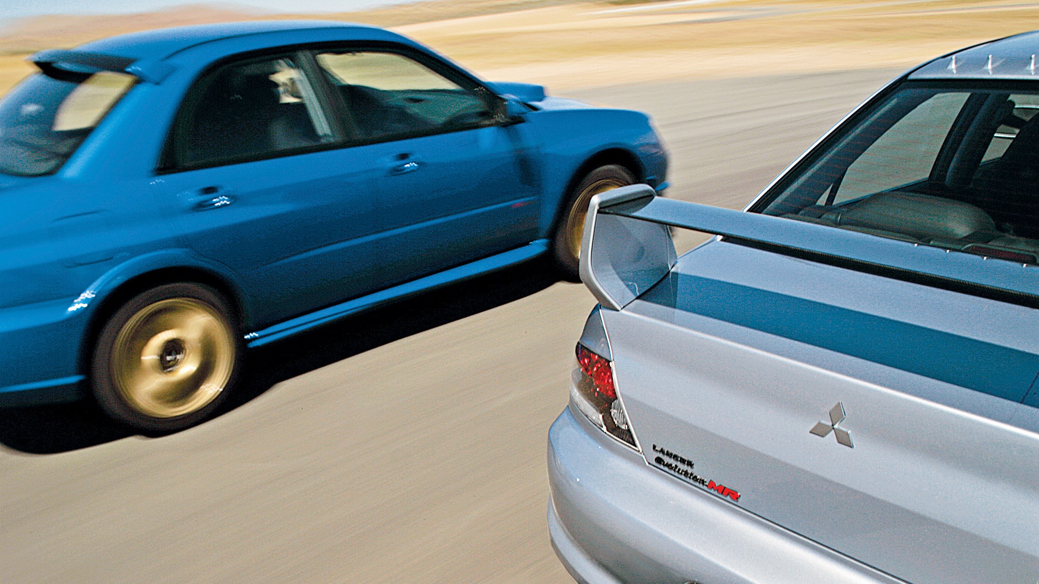 001 2006 mitsubishi lancer evolution ix vs subaru wrx sti