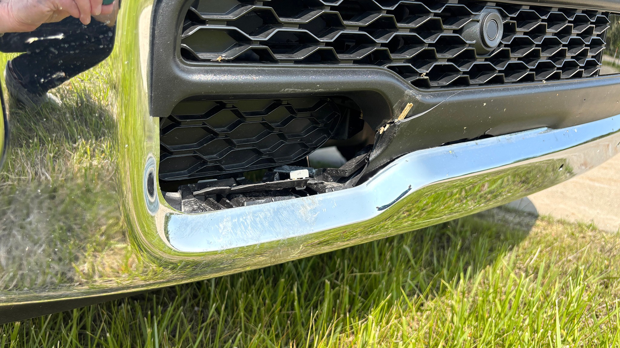 Arrival Photo Bumper Grille Damage