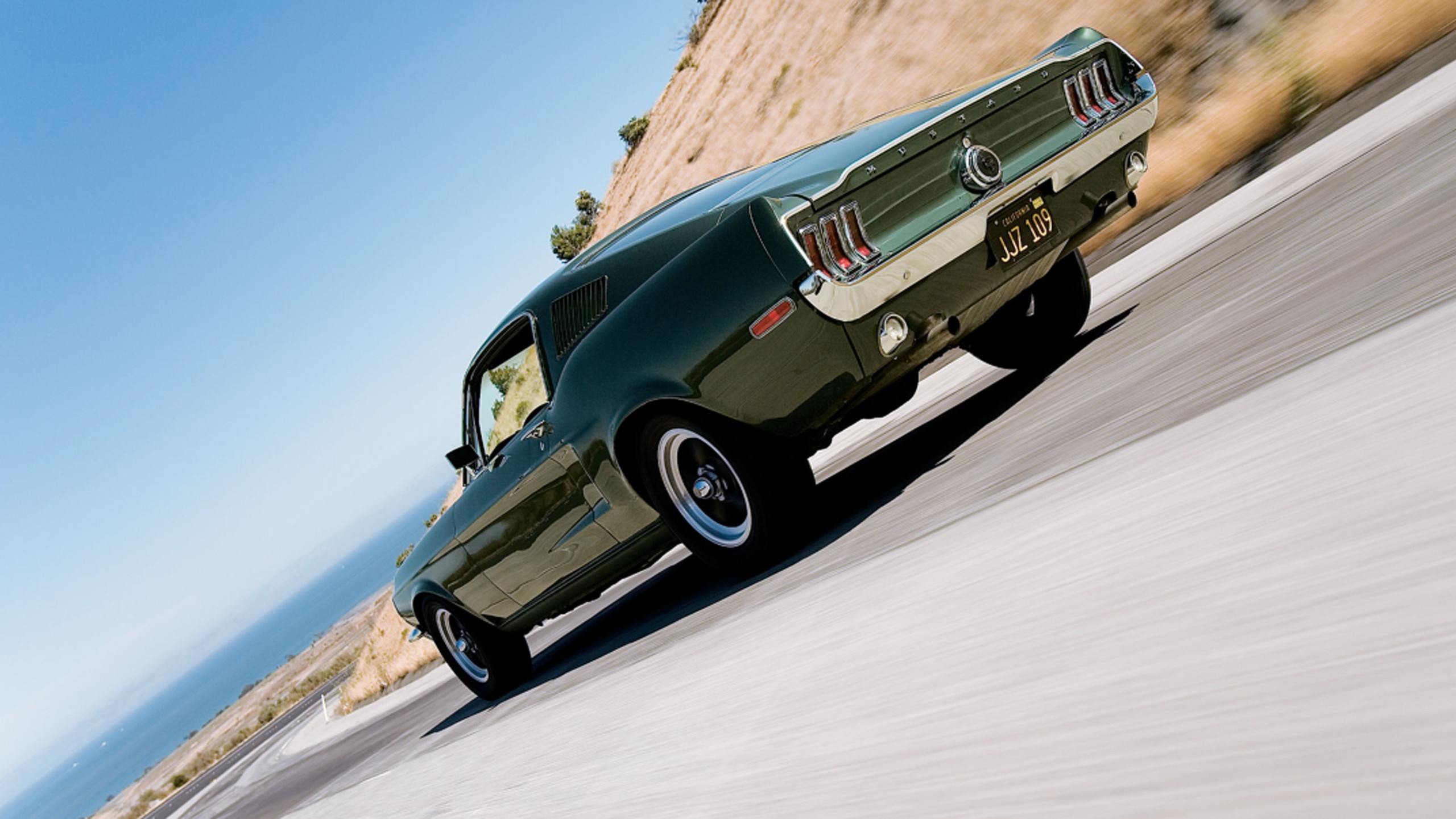 018 bullitt 1968 mustang gt 390 replica highland green rear driving