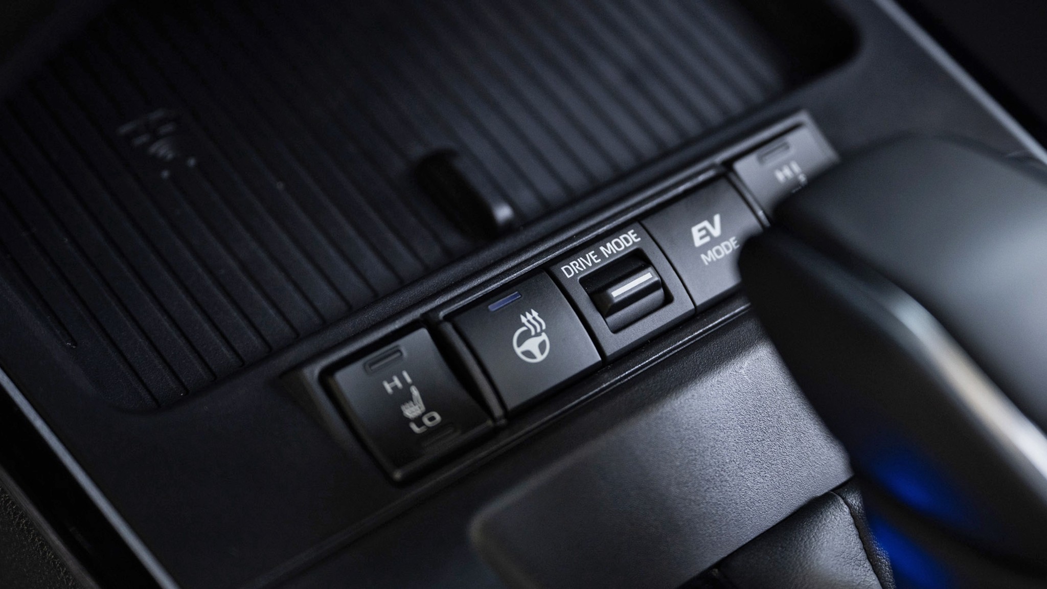 2026 Toyota Corolla Cross Hybrid XSE AWD blue detail center console 417