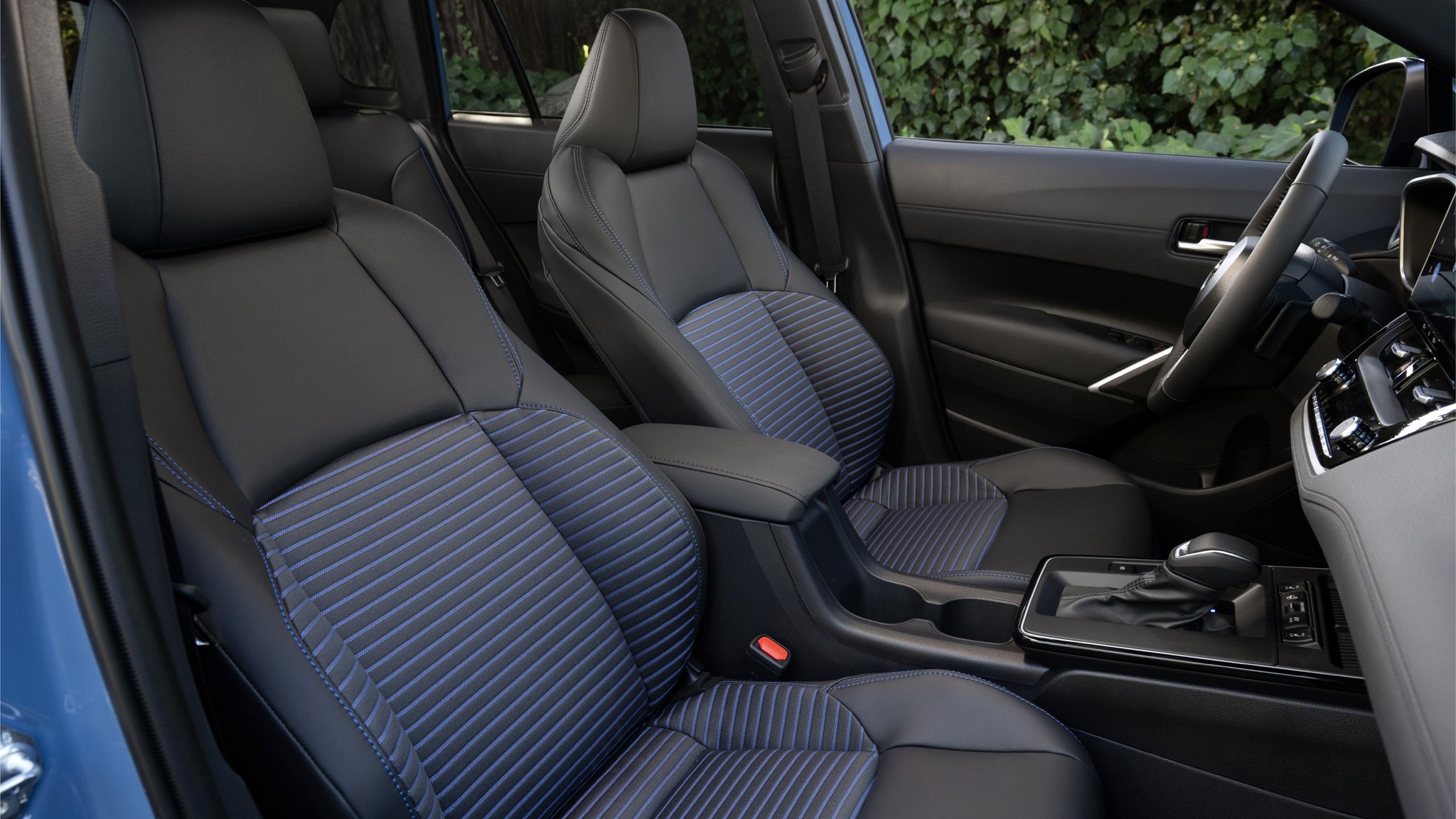 2026 Toyota Corolla Cross Hybrid XSE AWD blue front seats 409