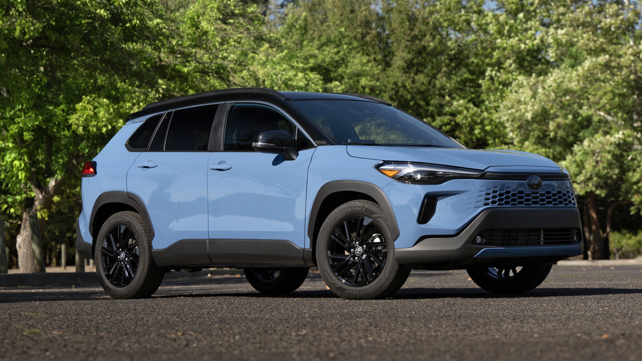 2026 Toyota Corolla Cross Hybrid XSE AWD blue front three quarter 030