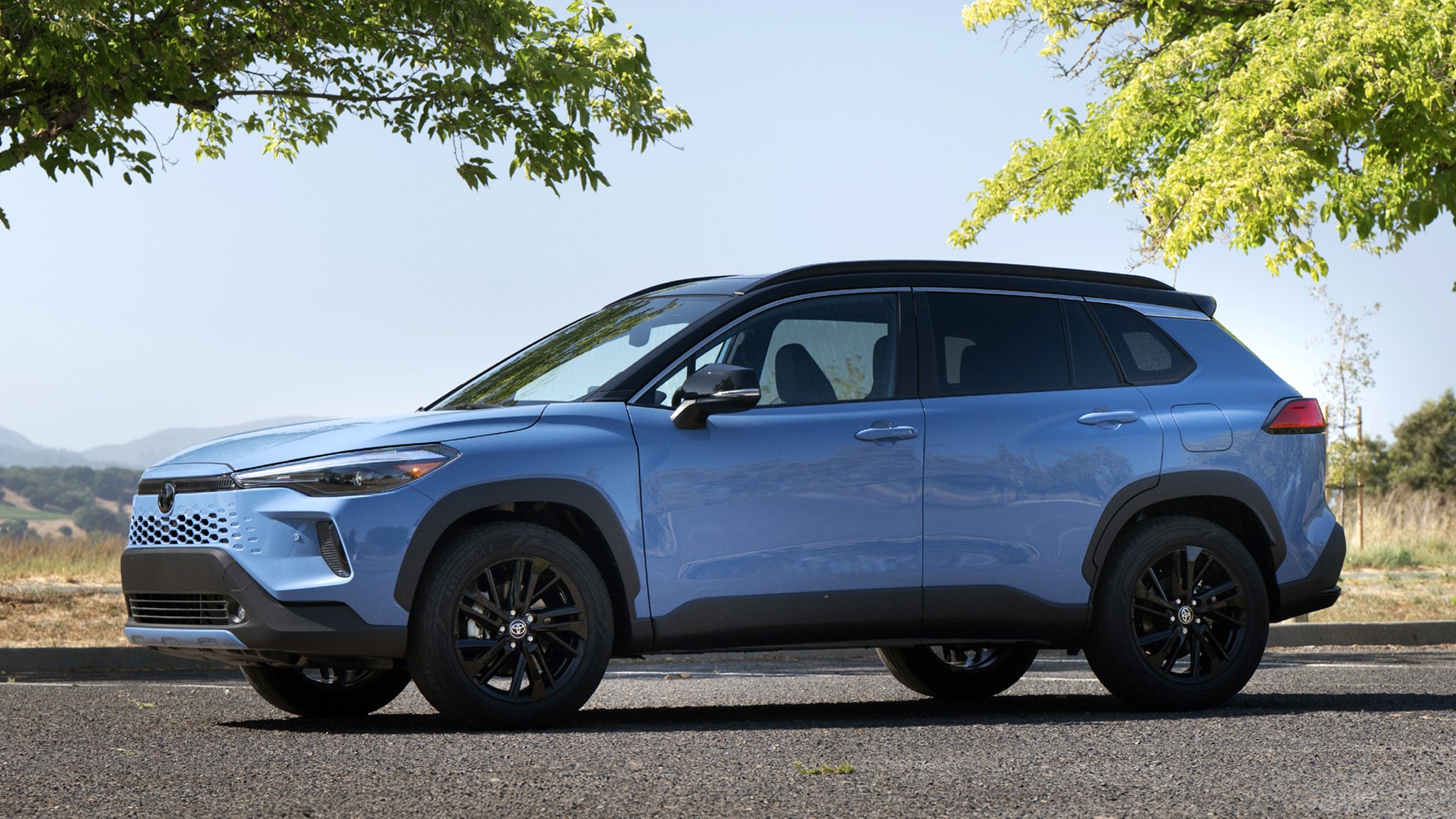 2026 Toyota Corolla Cross Hybrid XSE AWD blue side 018