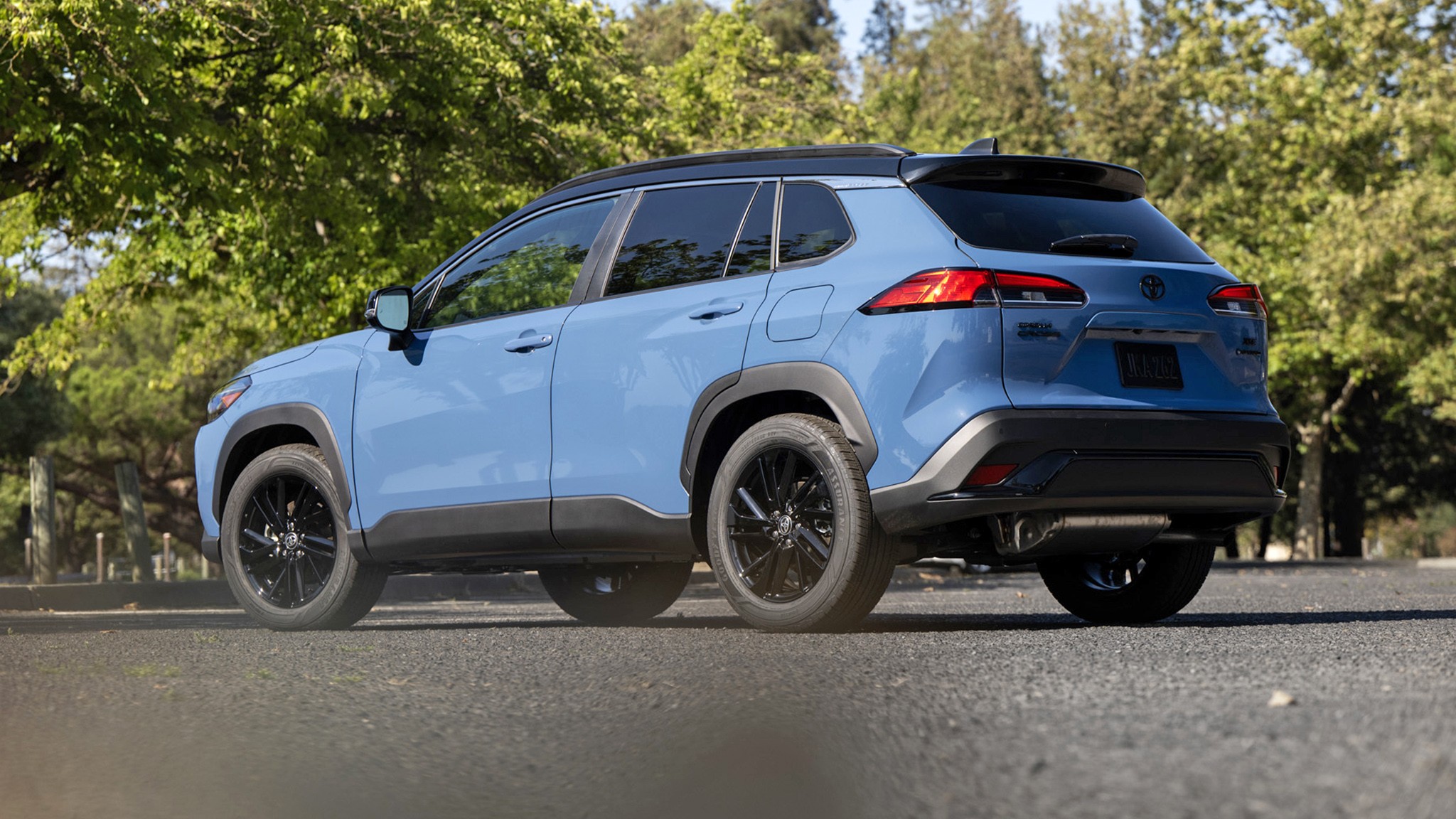 2026 Toyota Corolla Cross Hybrid XSE AWD blue side three quarter013