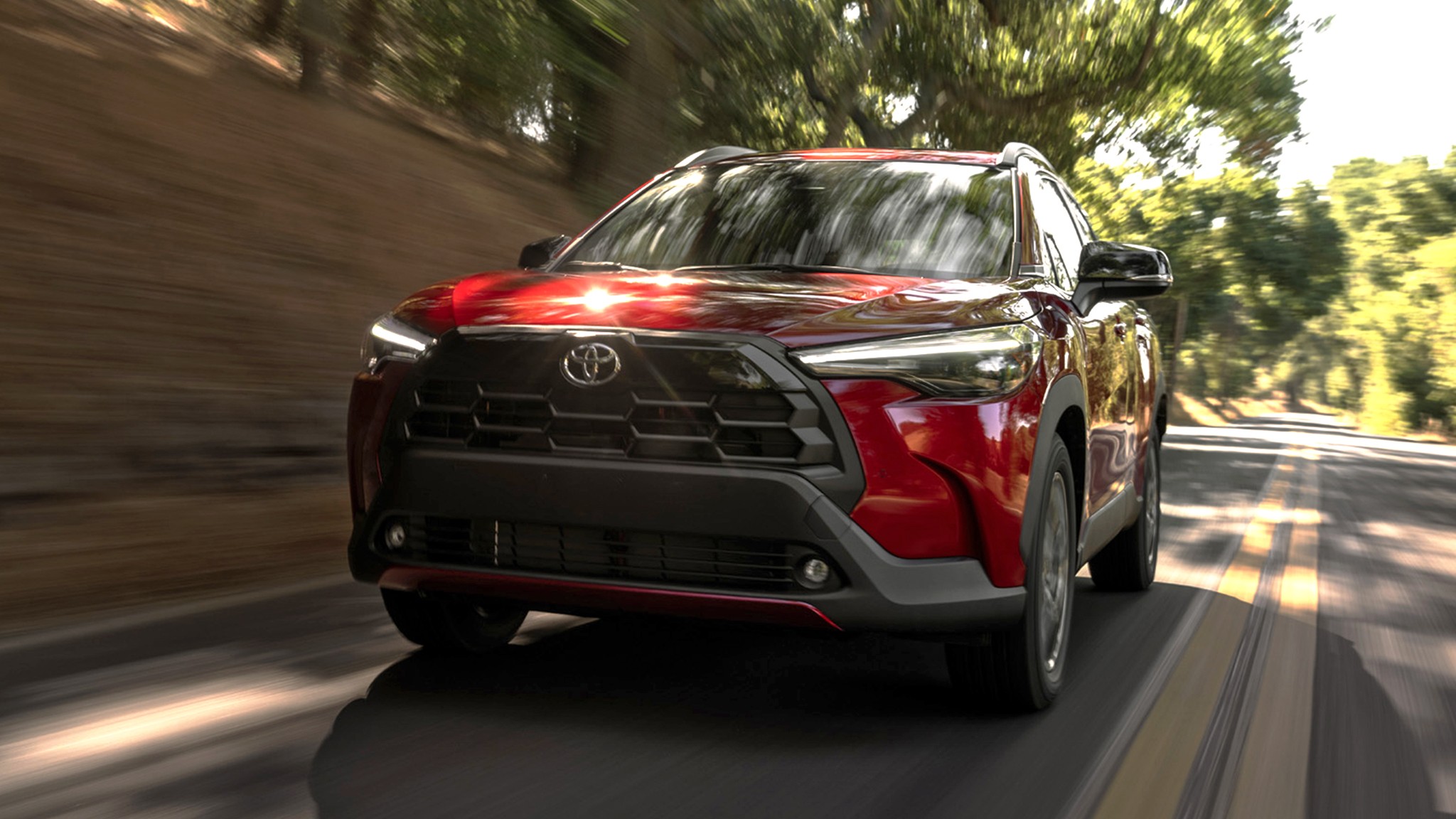 2026 Toyota Corolla Cross XLE AWD red front action 211