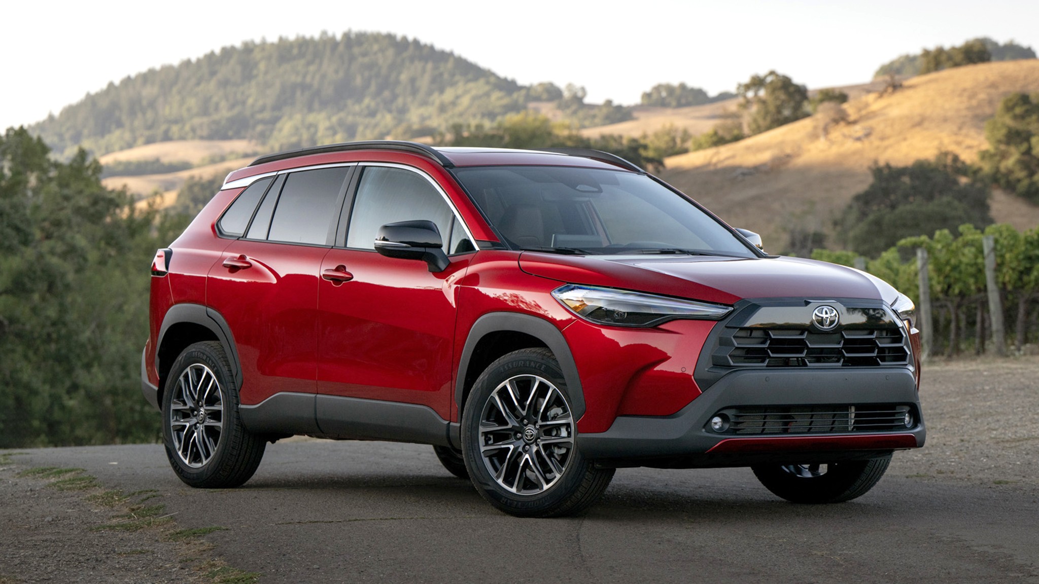 2026 Toyota Corolla Cross XLE AWD red front three quarter 004