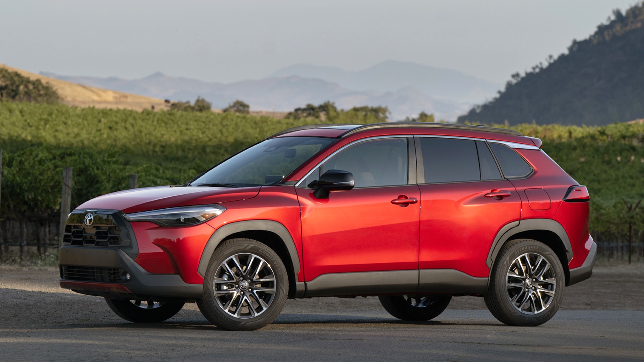 2026 Toyota Corolla Cross XLE AWD red side 001