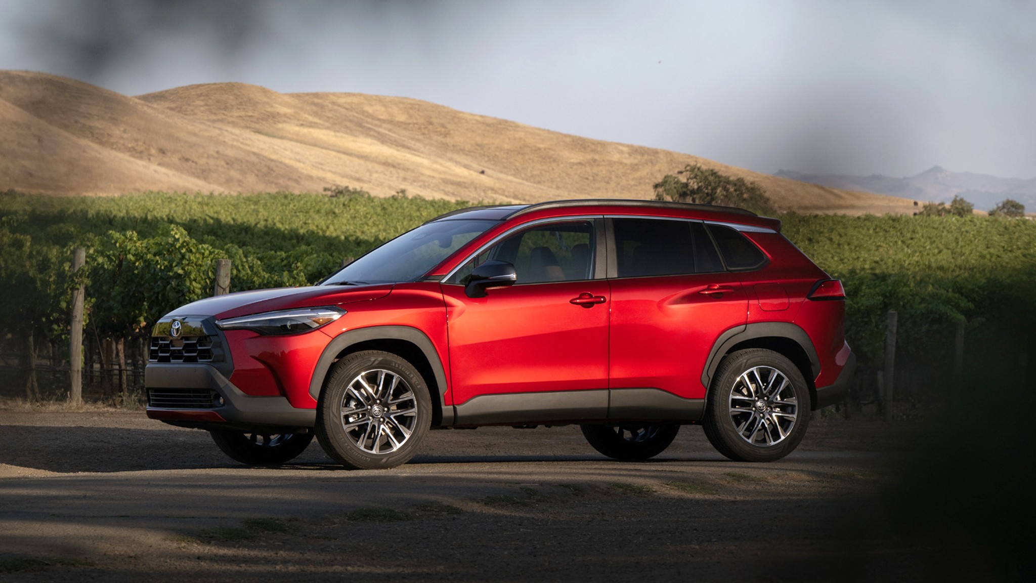 2026 Toyota Corolla Cross XLE AWD red side 014