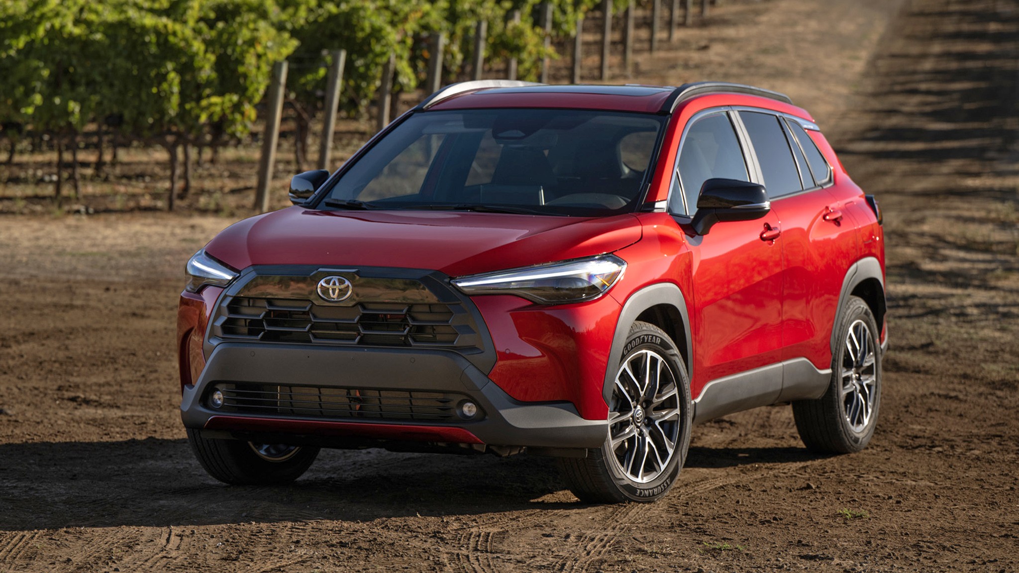 2026 Toyota Corolla Cross XLE FWD red front three quarter 003