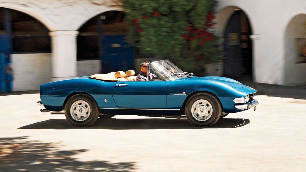 005 fiat dino 2400 spider blue side view driving ferrari engine motor trend classic