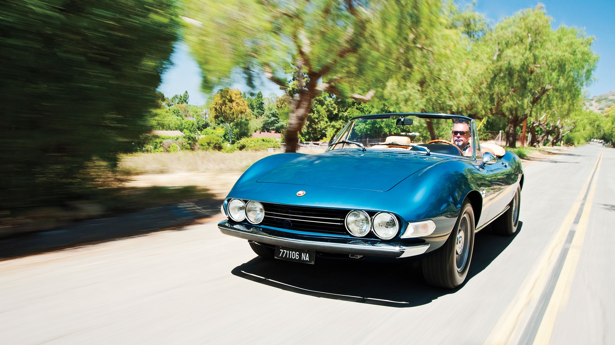 024 fiat dino 2400 spider front three quarter driving ferrari engine motor trend classic