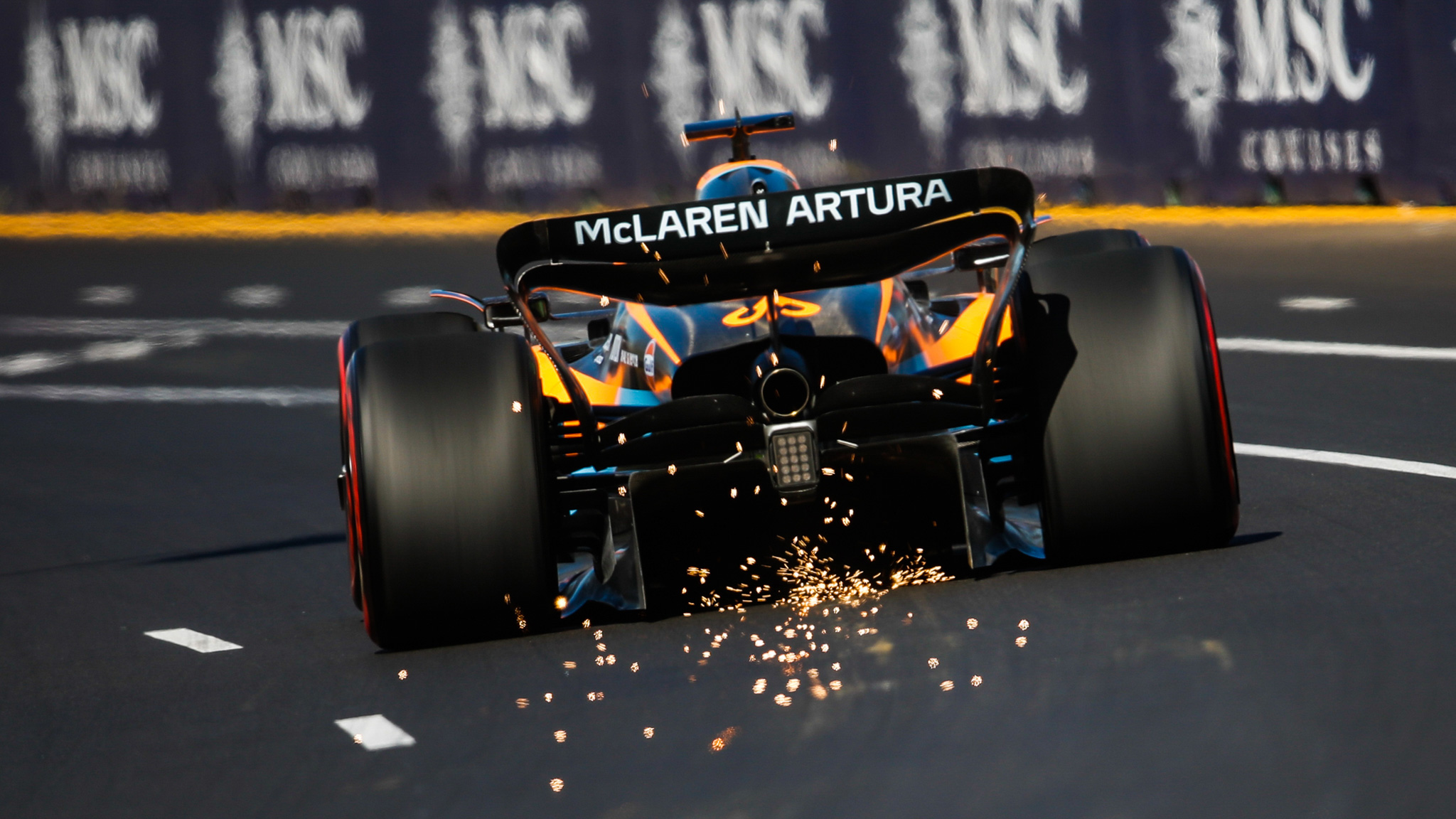 Sparks fly from Daniel Ricciardo, McLaren MCL36