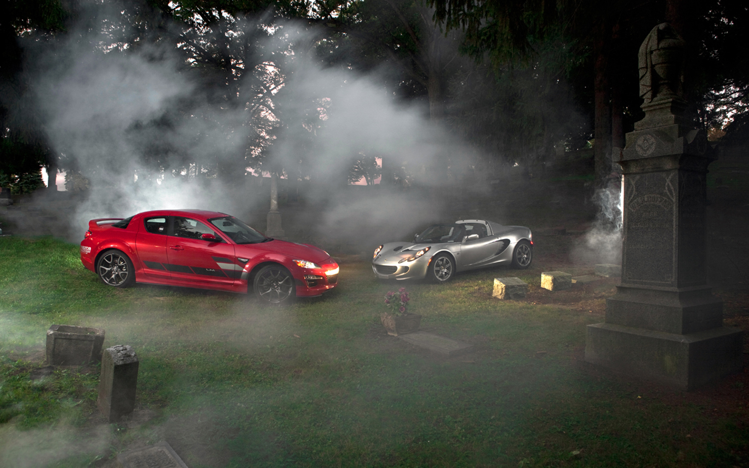 2012 lotus elise and 2012 mazda RX 8 parked