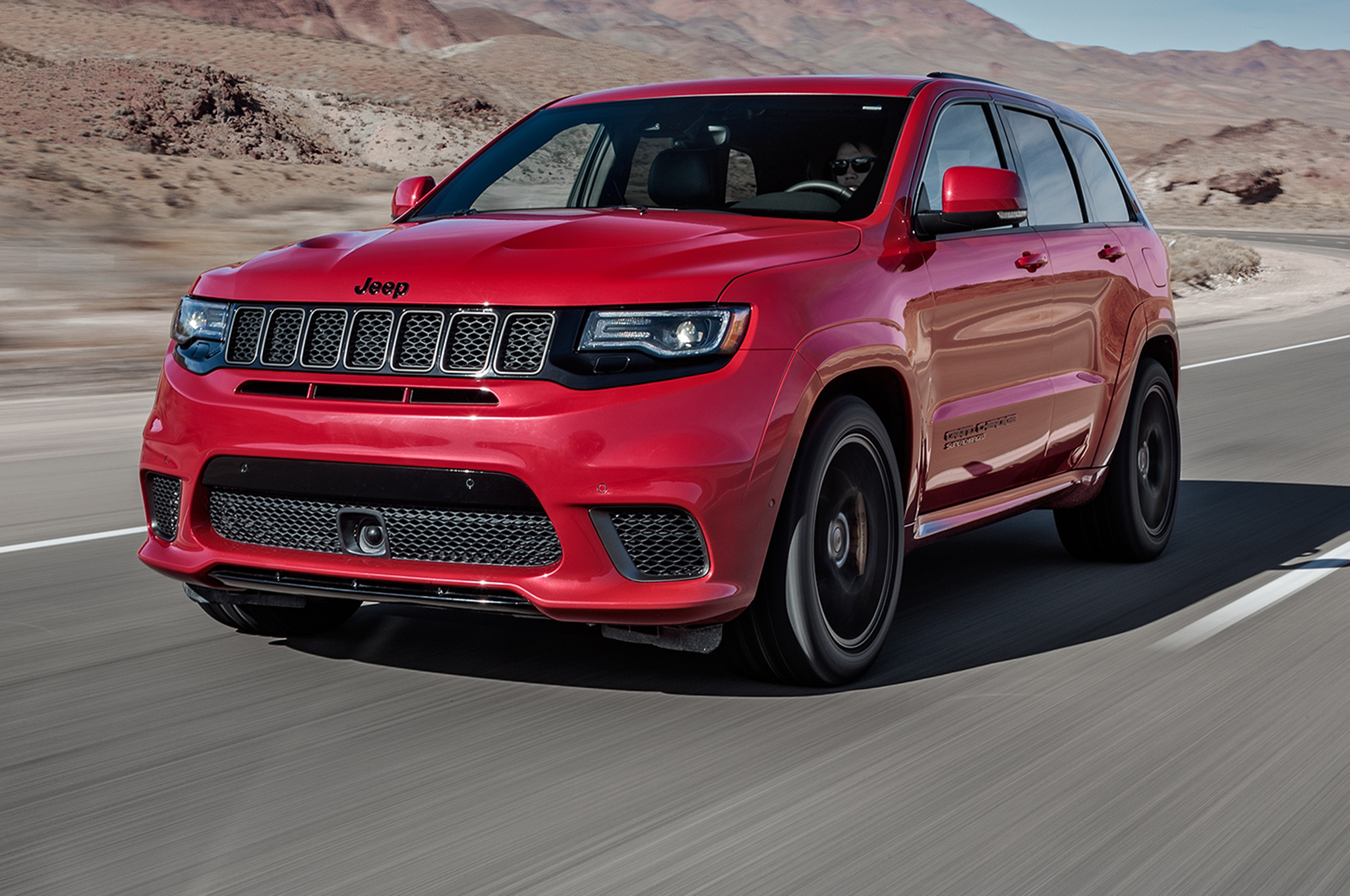 2018 Jeep Grand Cherokee Trackhawk front three quarter in motion 05