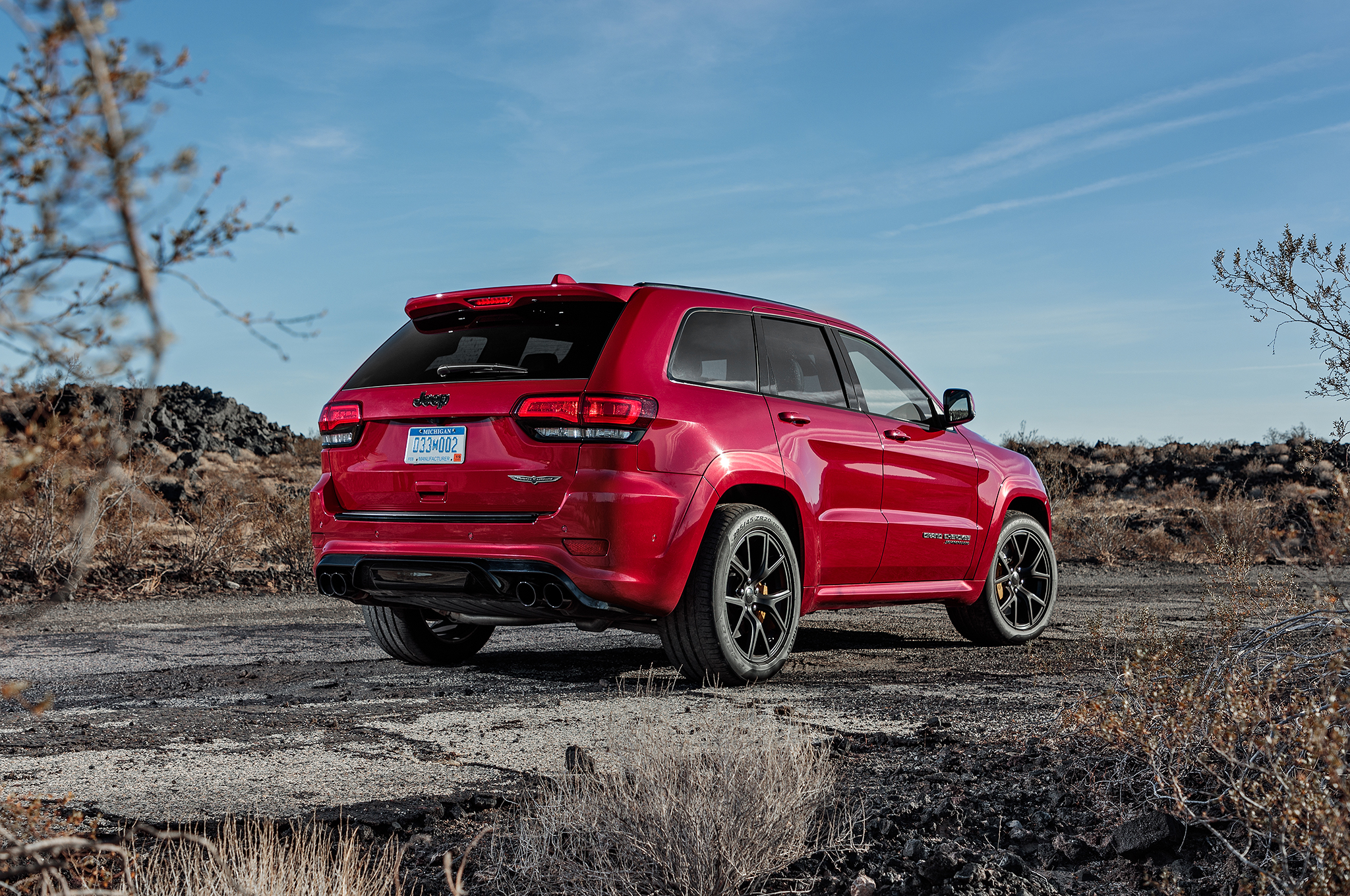 2018 Jeep Grand Cherokee Trackhawk rear three quarter 02