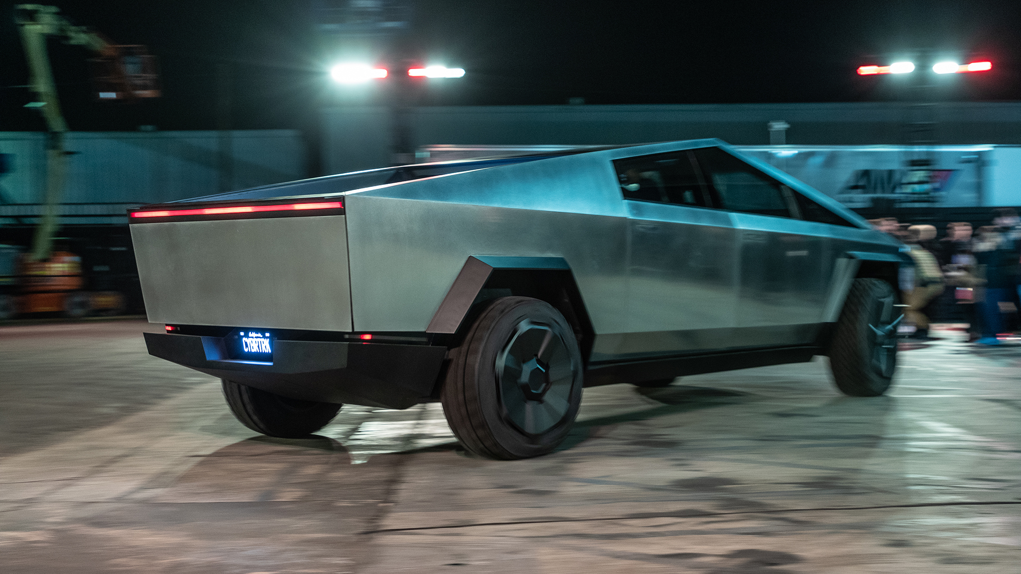 Tesla Cybertruck electric pickup rear side view